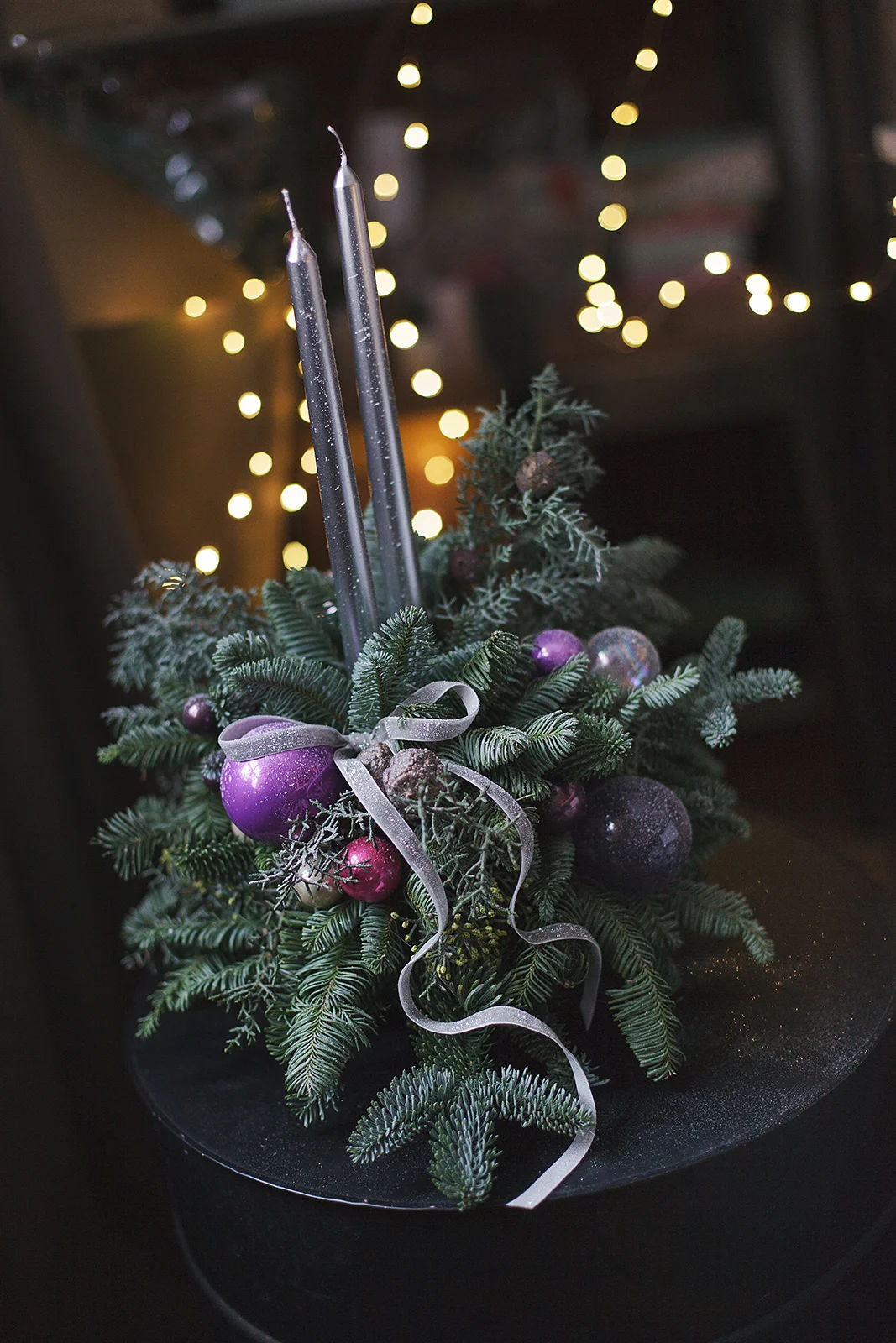 Композиция из нобилиса со свечами